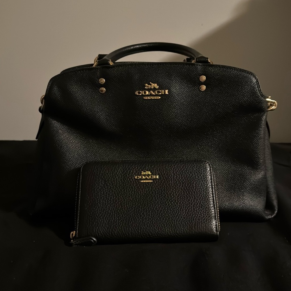 Black coach purse with matching wallet